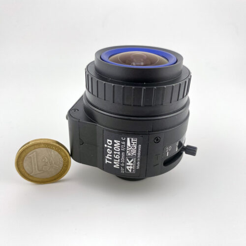 Theia ML610M lens 3/4 with coin