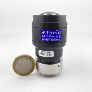 Theia SY125M lens with coin