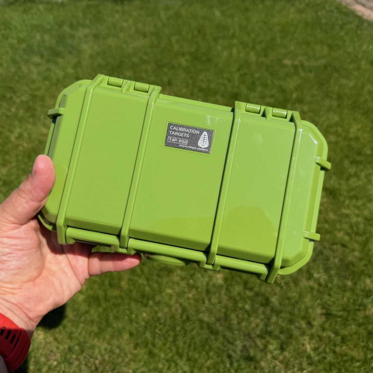 Mapir T4P-R50 reflectance calibration target in hand closed